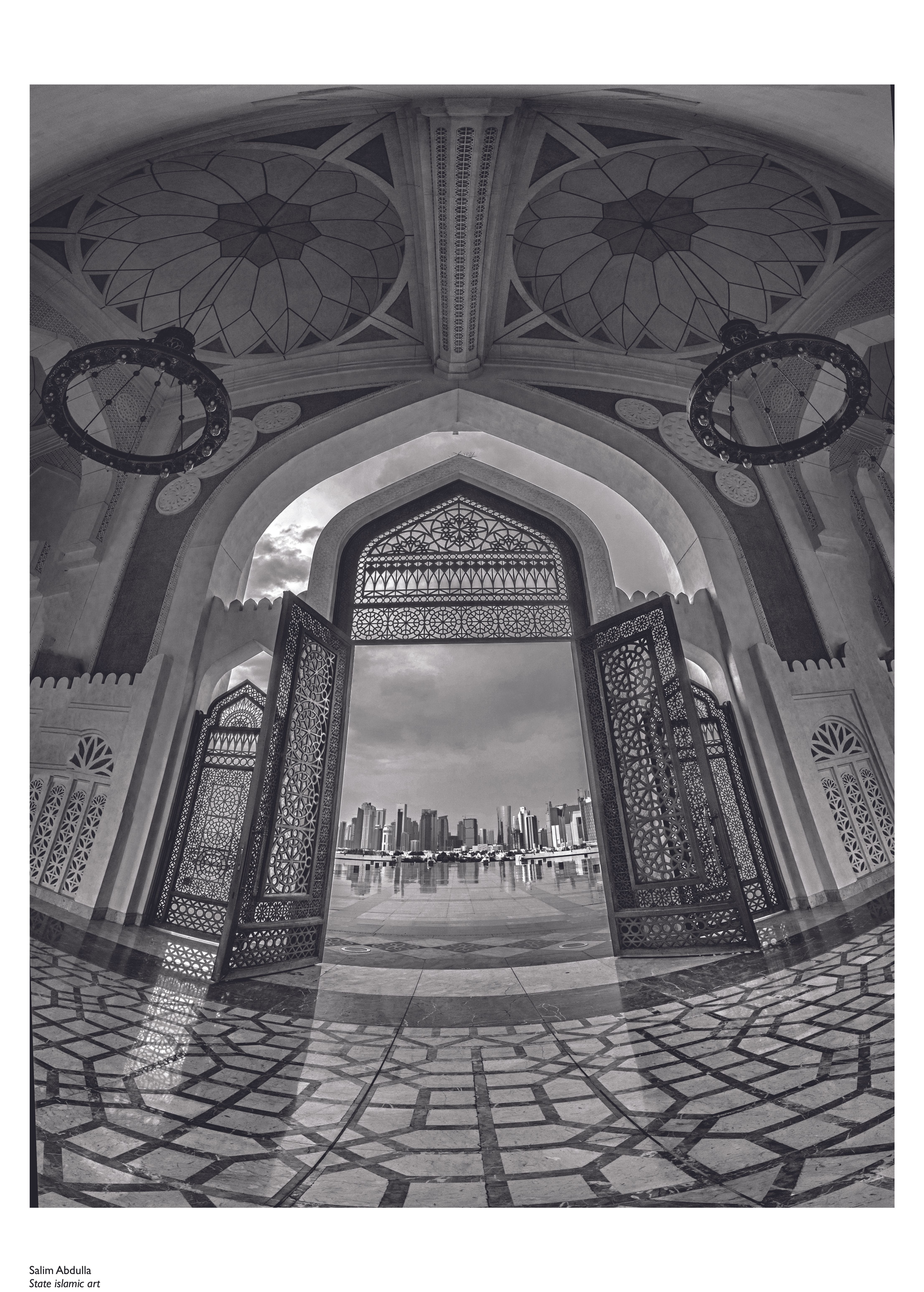 Looking out through the doorway of a mosque towards the city skyline, during the Qatar-India 2019 photography exchange. 