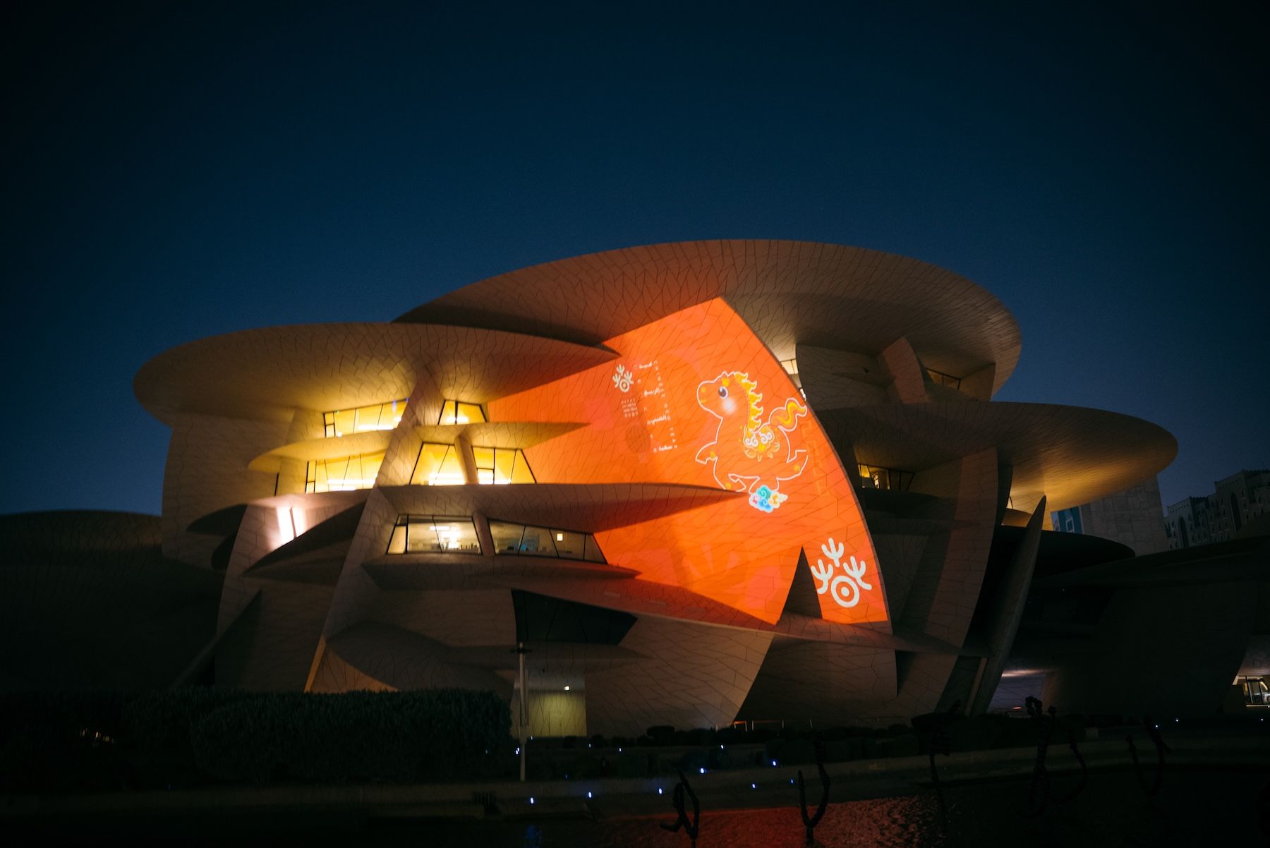 Light projections for Chinese New Year 2026 on the National Museum of Qatar
