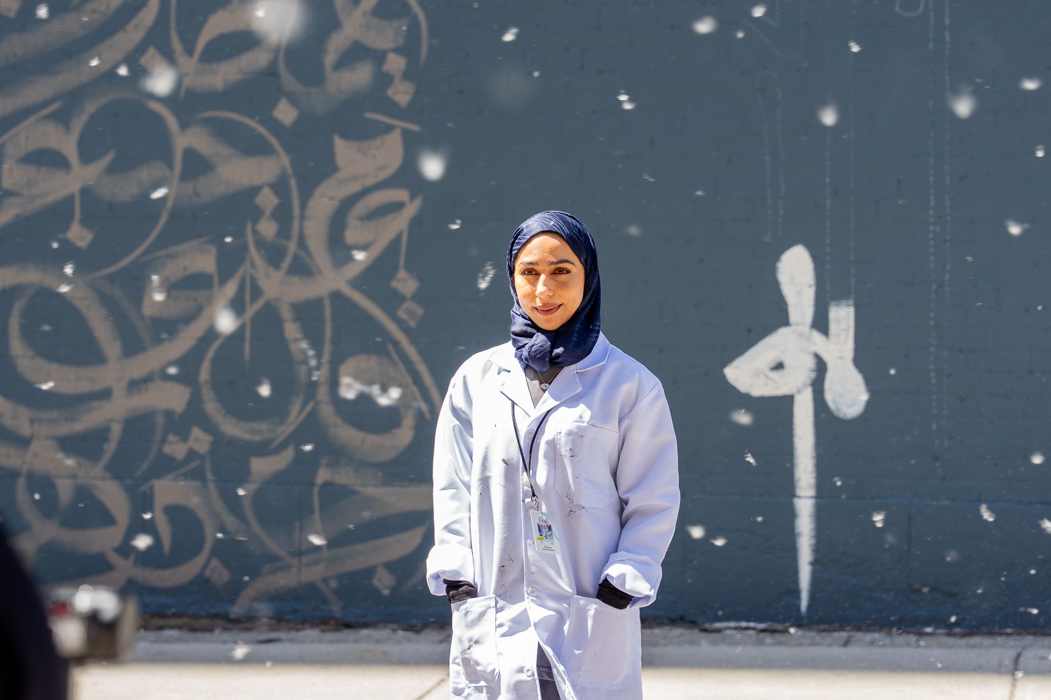Fatima Alsharshani in front of her mural in Montreall_Courtesy of Years of Culture.jpg