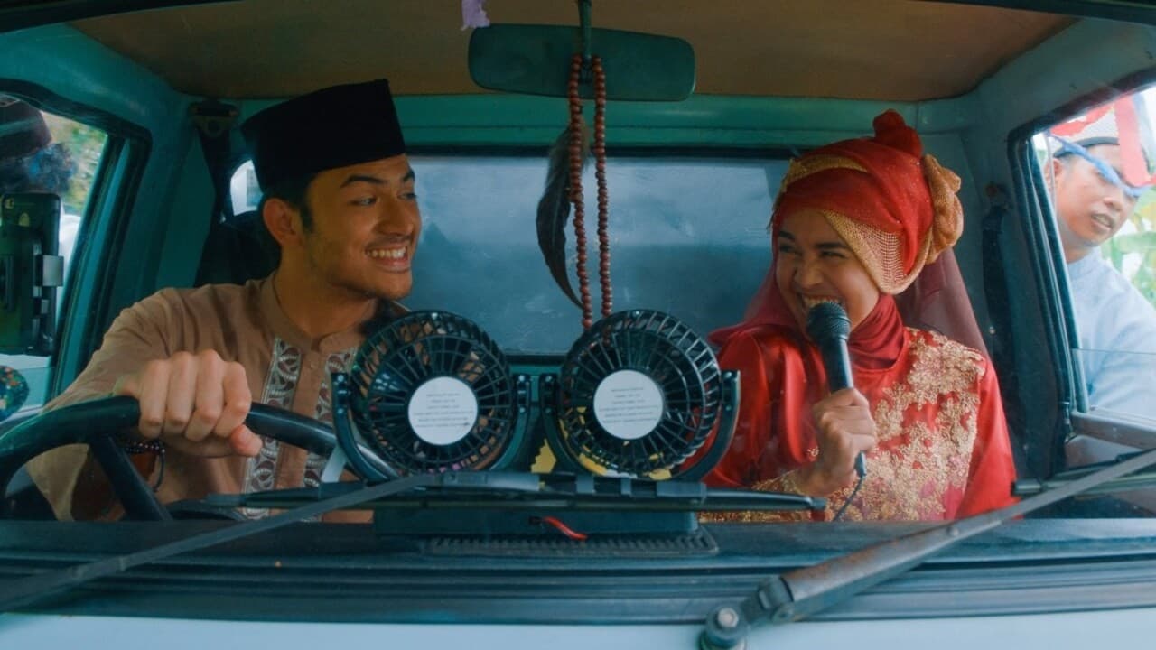 Movie still from the film 'Mecca, I'm Coming', man & woman singing in a car