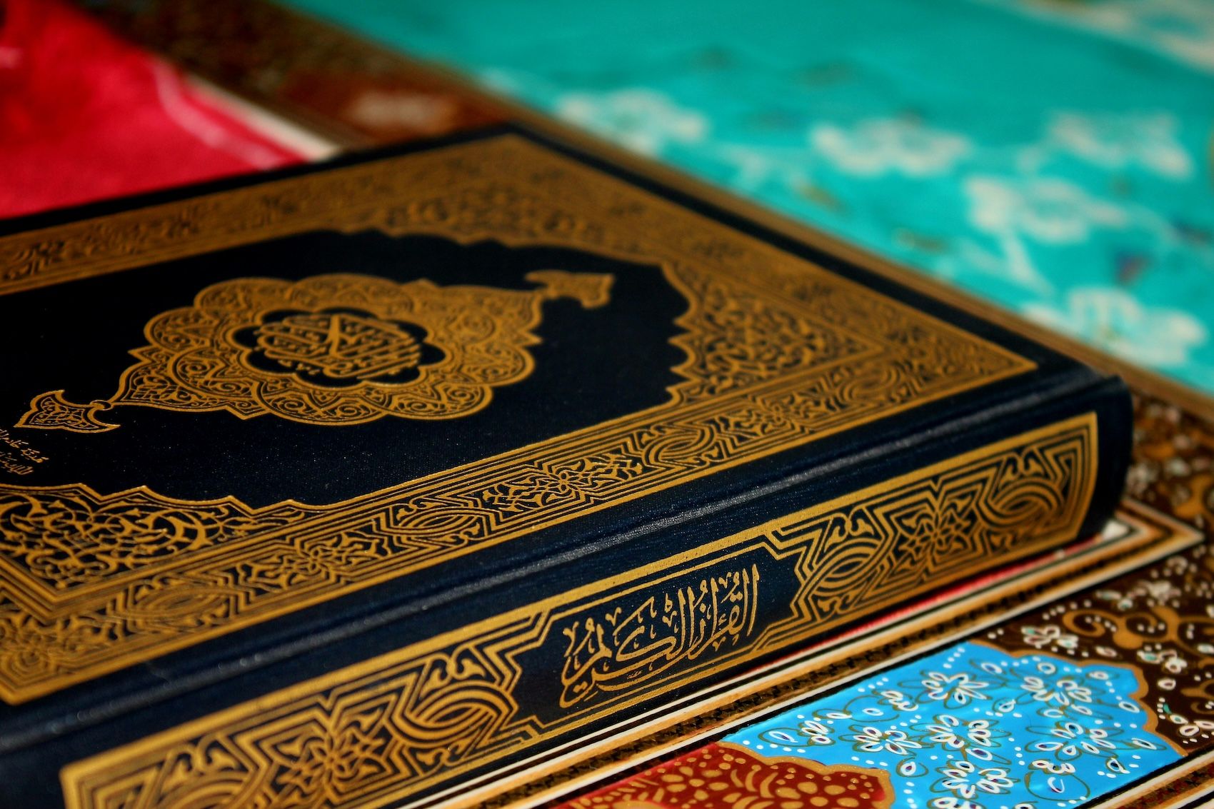 Close up of a Quran book on a table.