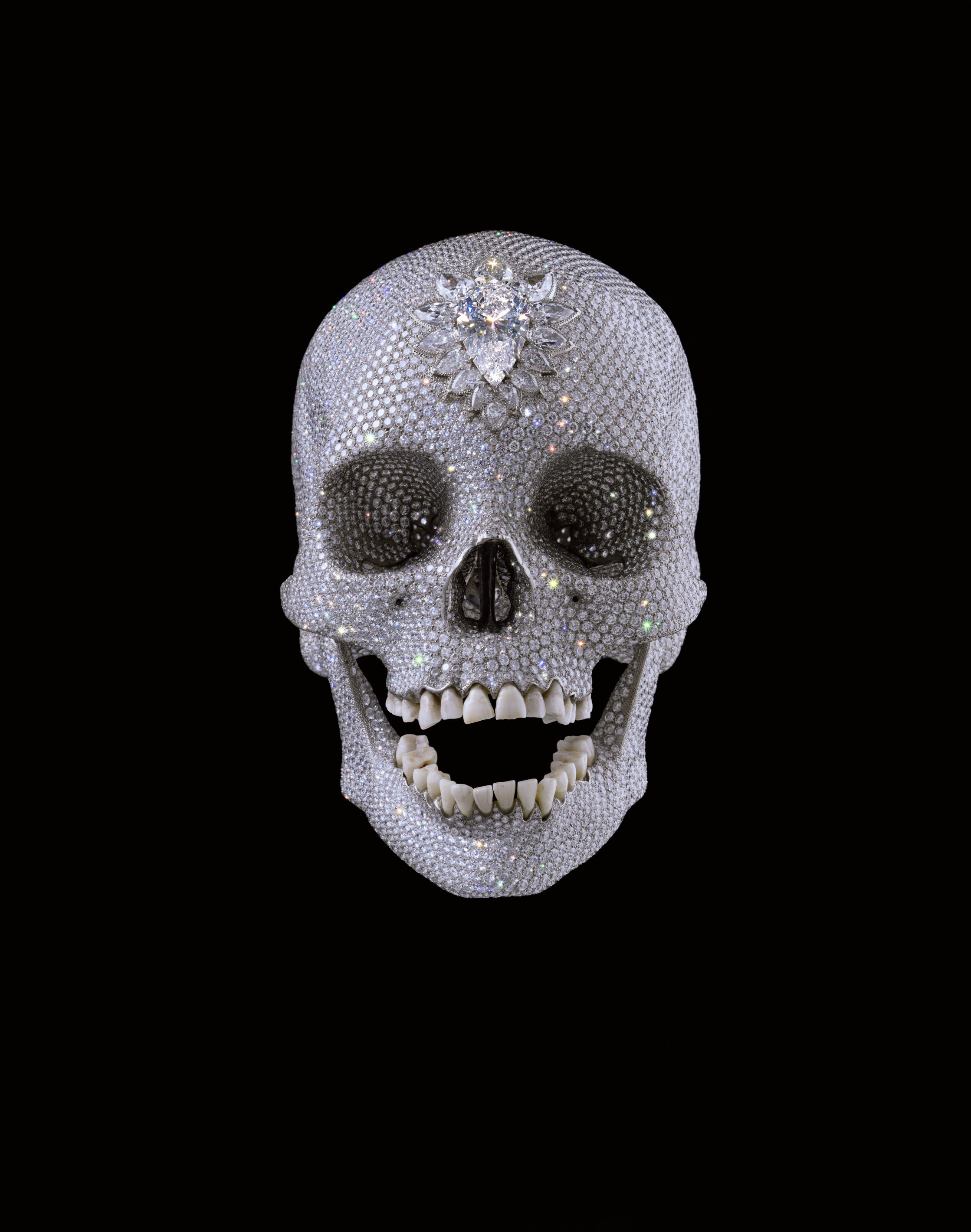 Sculpture made from a cast of a human skull covered in diamonds by artist Damien Hirst.