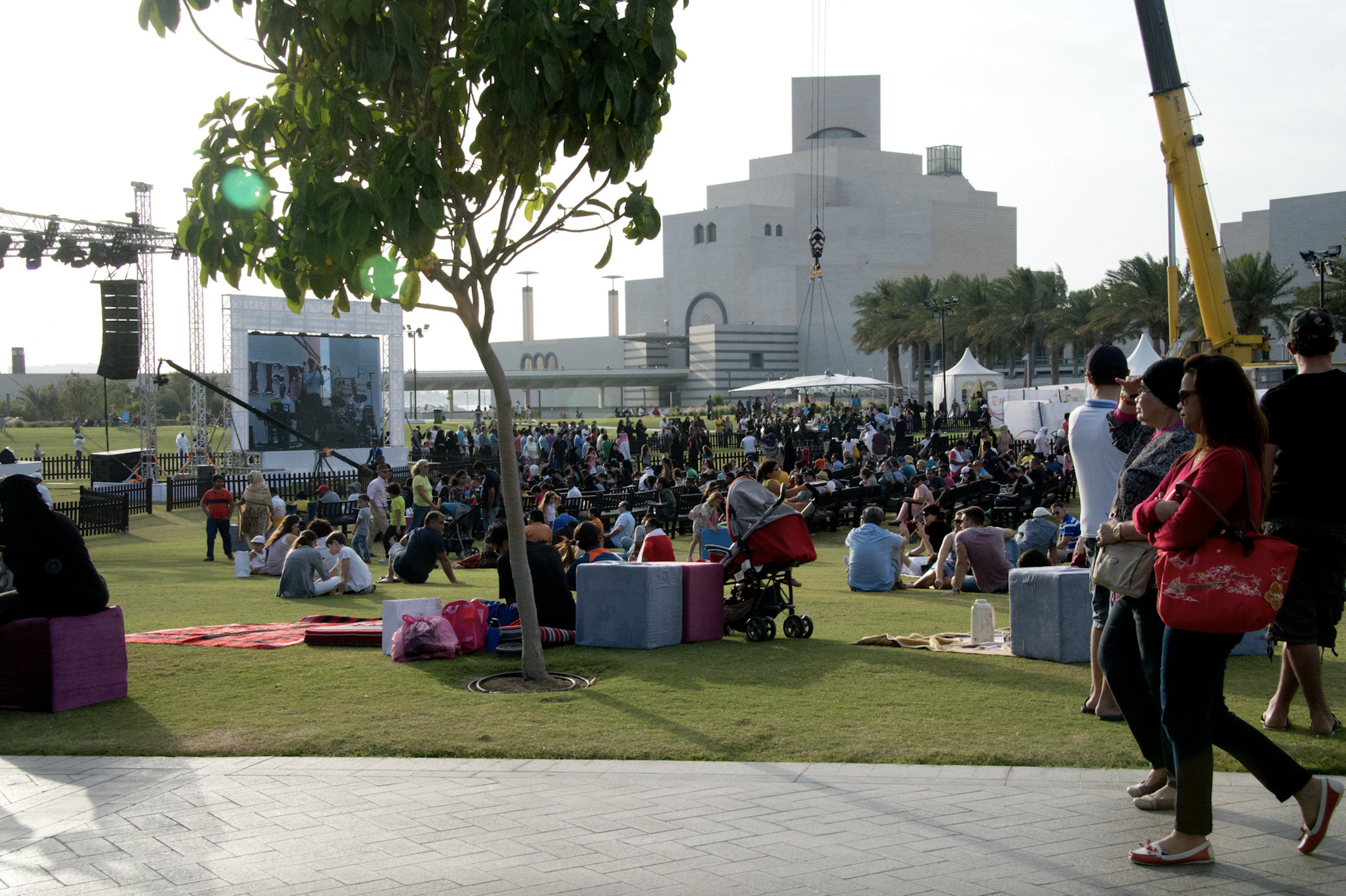 An outdoor food festival on the grass at Museum of Islamic Art Park during Qatar-Brazil 2015.