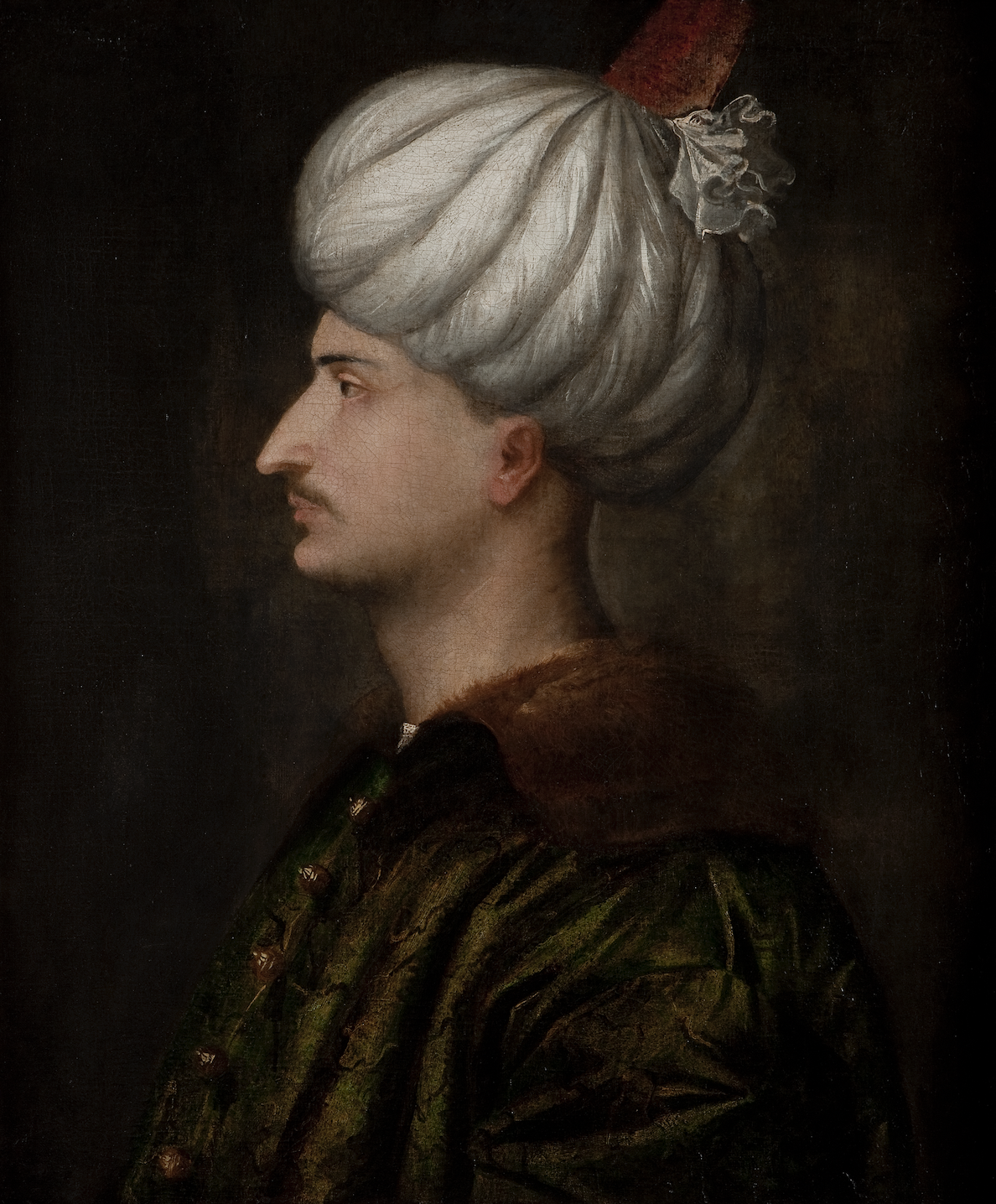 Historic painted portrait of a man in profile, wearing a luxurious jacket and a white turban.