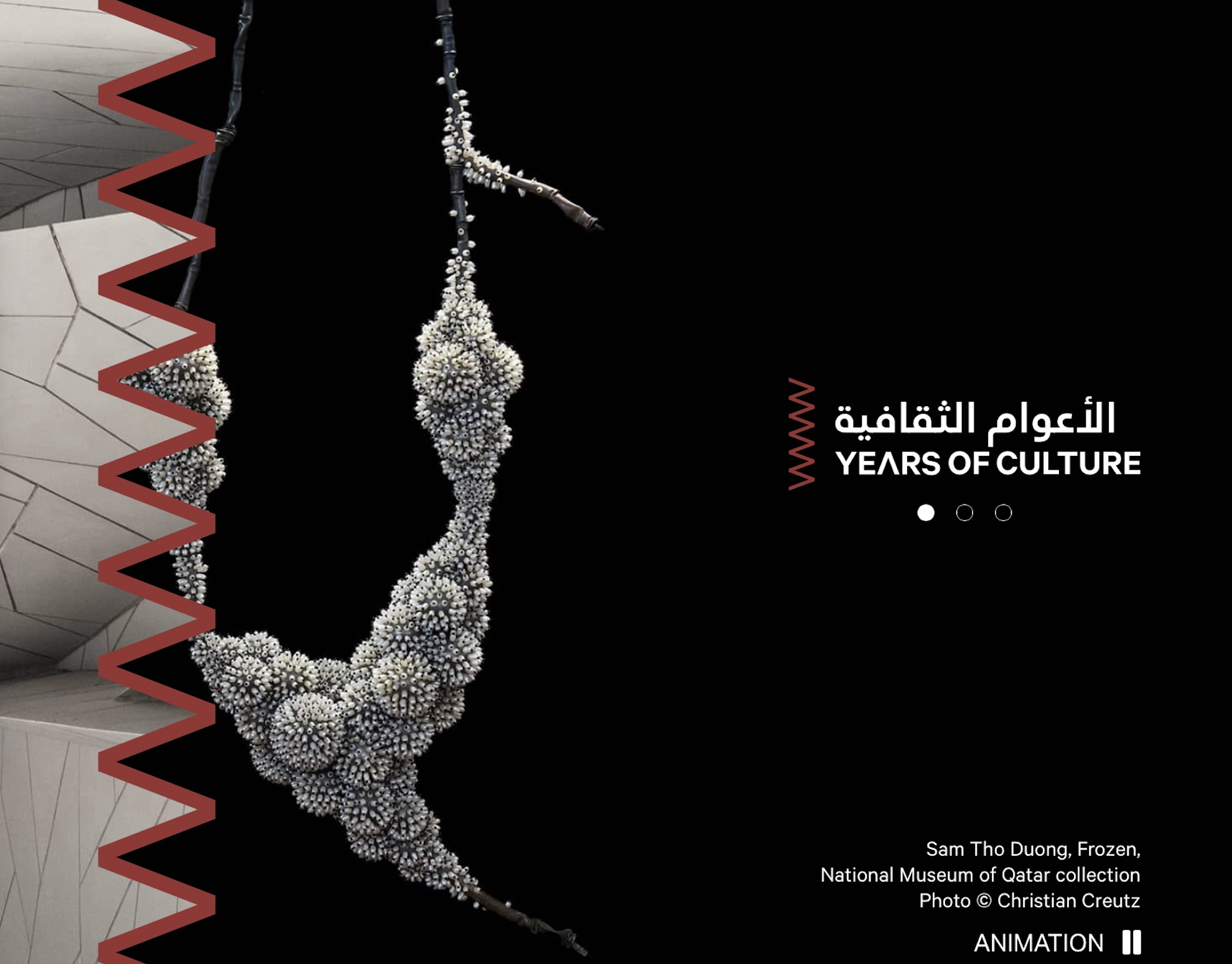 Years of Culture logo on a black background, with a contemporary pearl necklace from the National Museum of Qatar collection.