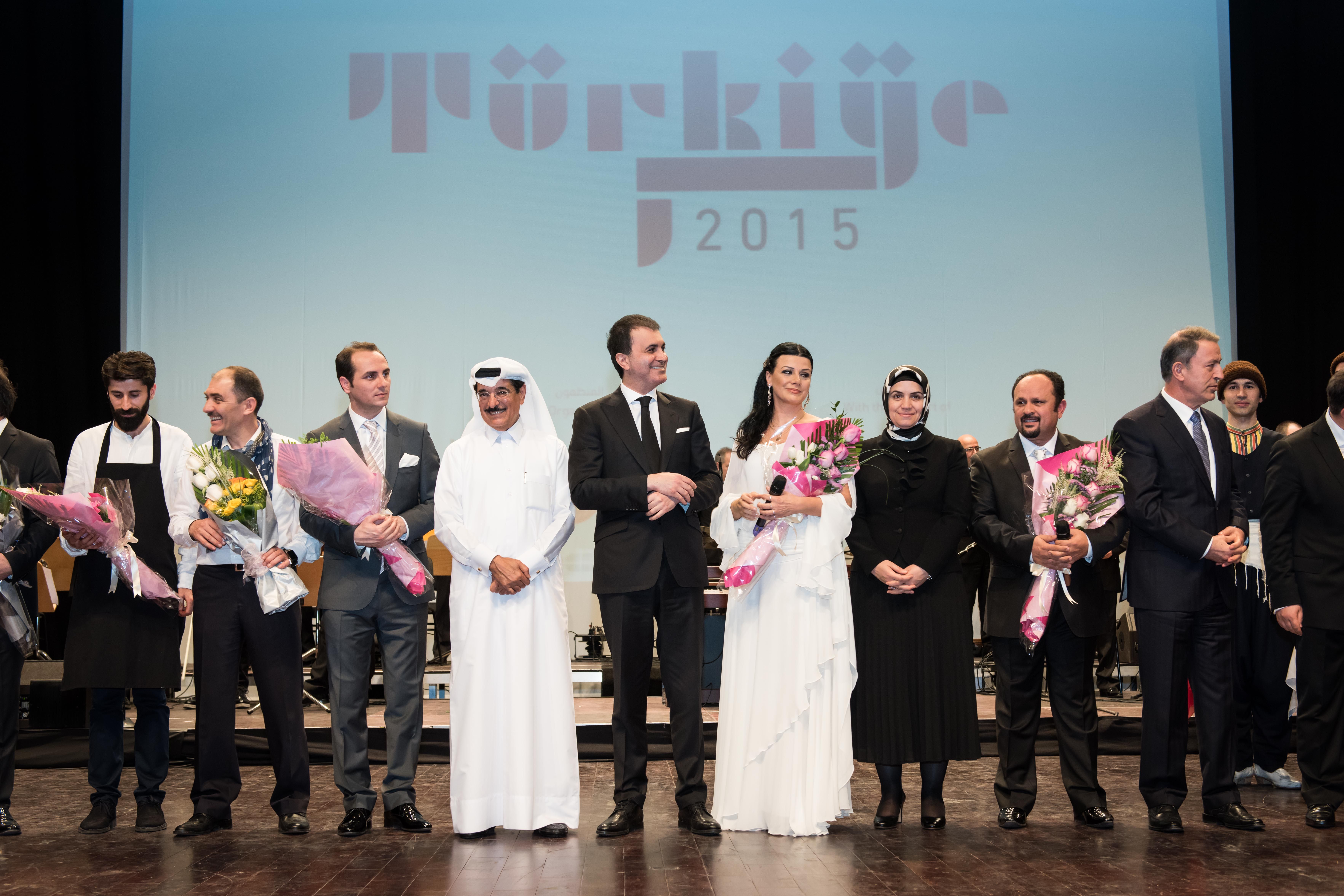 Important officials stand on stage and receive flowers during the opening ceremony for the Qatar-Turkey 2015 Year of Culture.